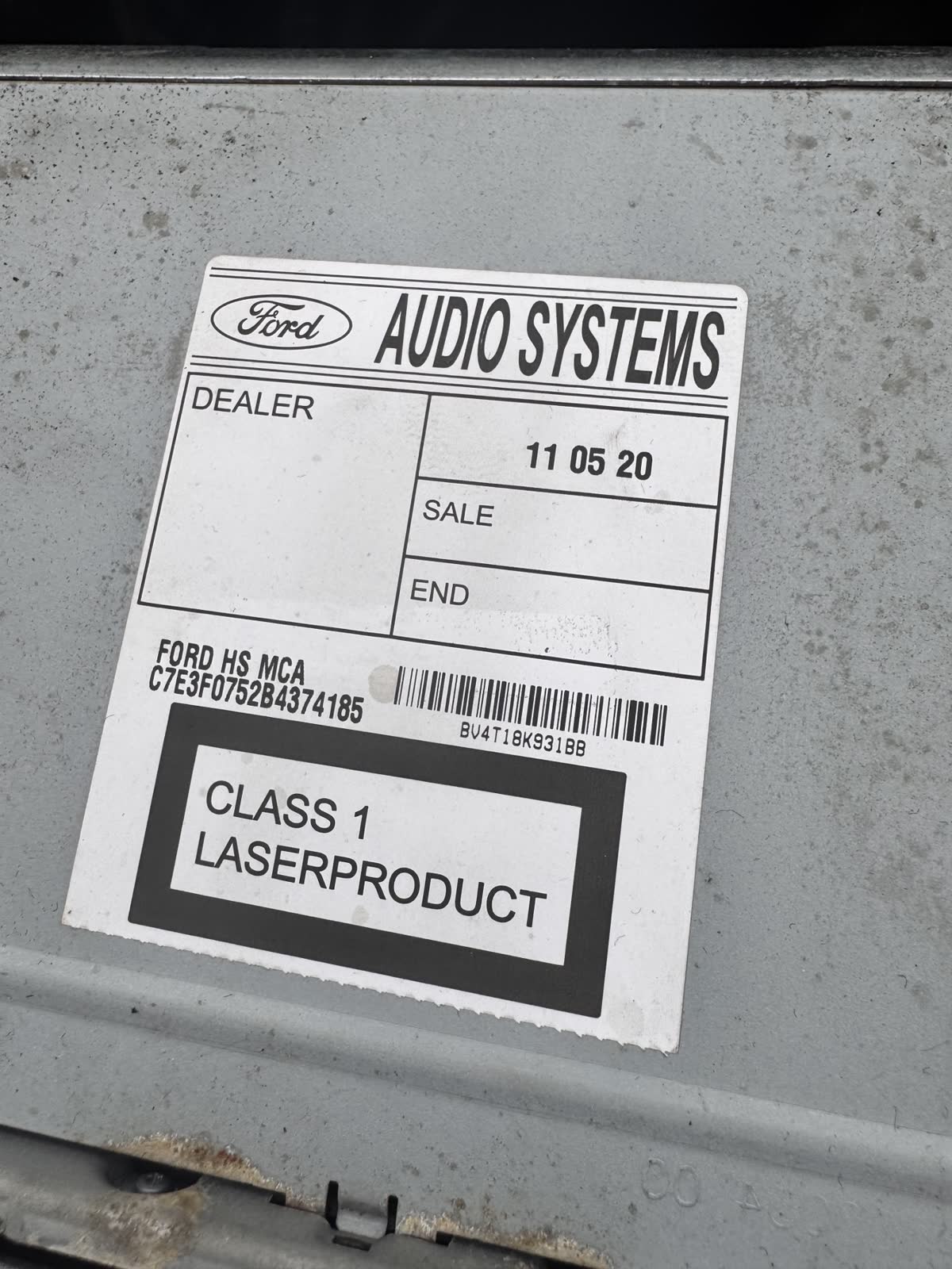 Ford Audio Systems HS MCA label on top of the radio with the C7E3F0752 serial number